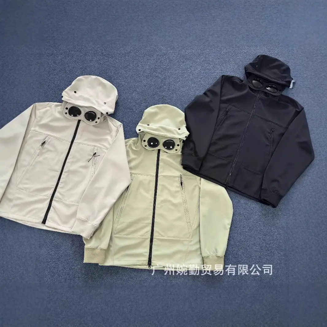 跨境外贸新款C.P徽章镜片冲锋衣防风男女户外软壳衣连帽登山外套