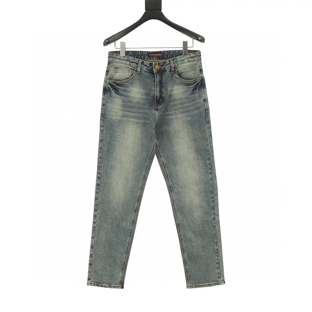 Louis Vuitton Embossed denim trousers