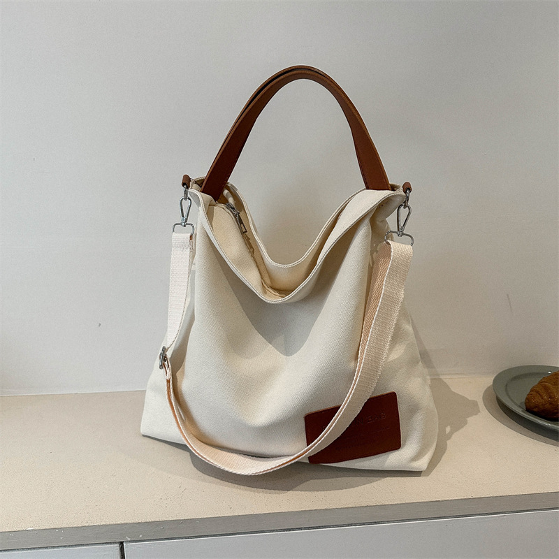 Canvas Bag Women's Large Capacity Niche Design Popular Texturing Handbag Commuter College Students Class Crossover Trendy Bag