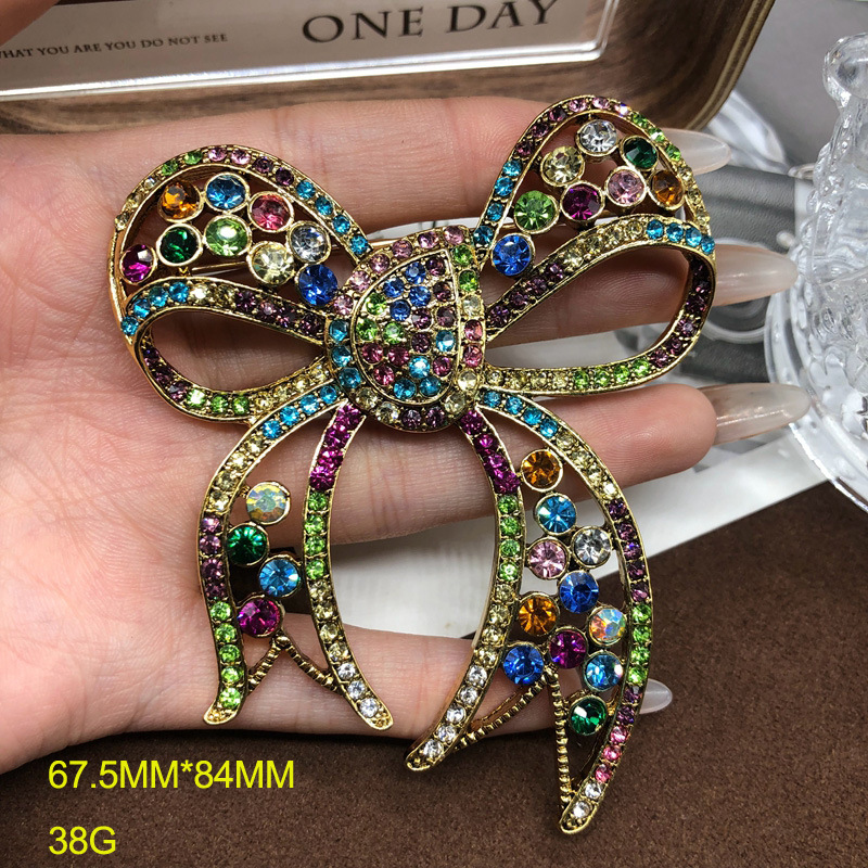 High-end mid-ancient vintage brooch classic color gem diamond bow corsage niche retro pin for women