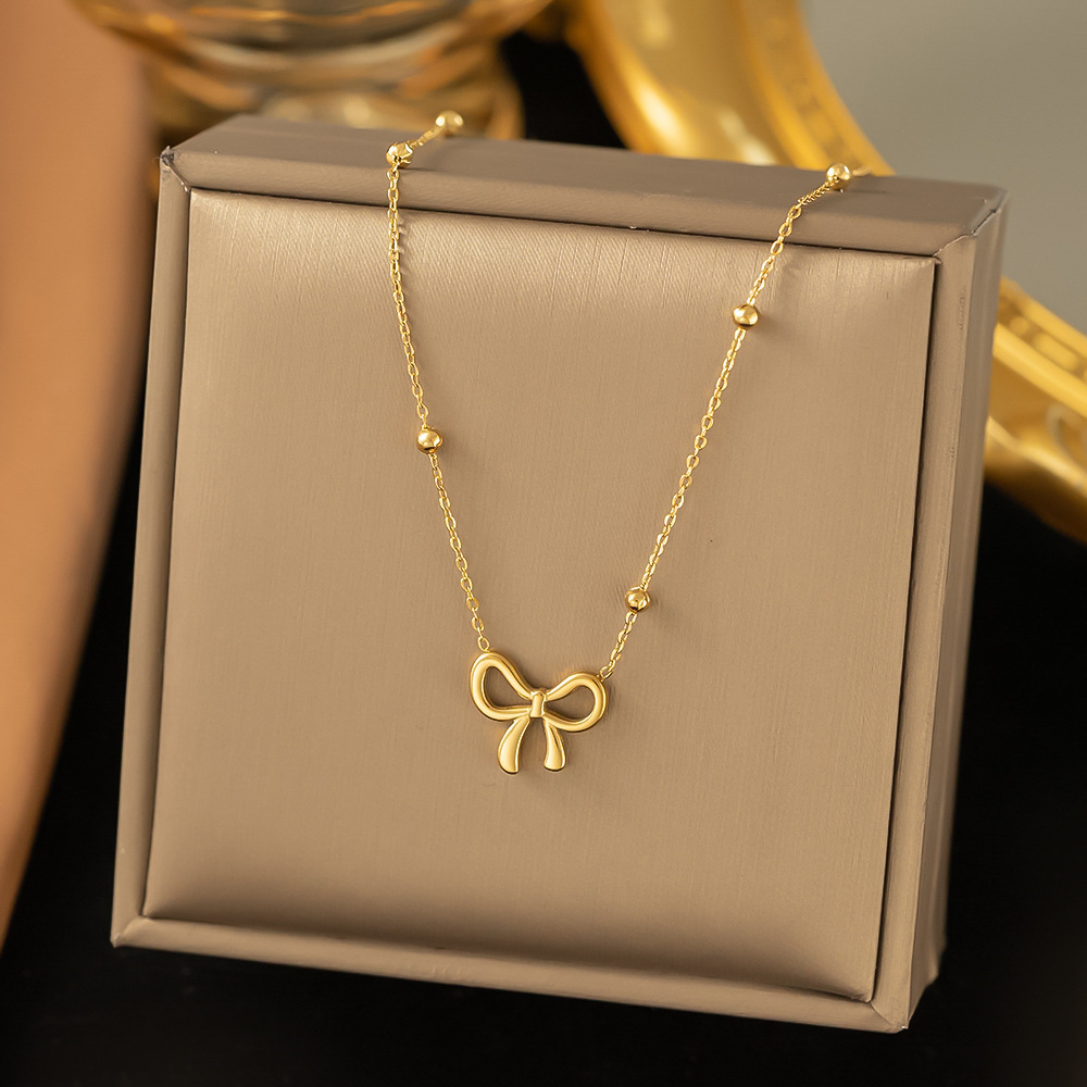 Cross-border wholesale online celebrity accessories simple all-match light luxury high-grade clavicle chain fashion bow titanium steel necklace for women