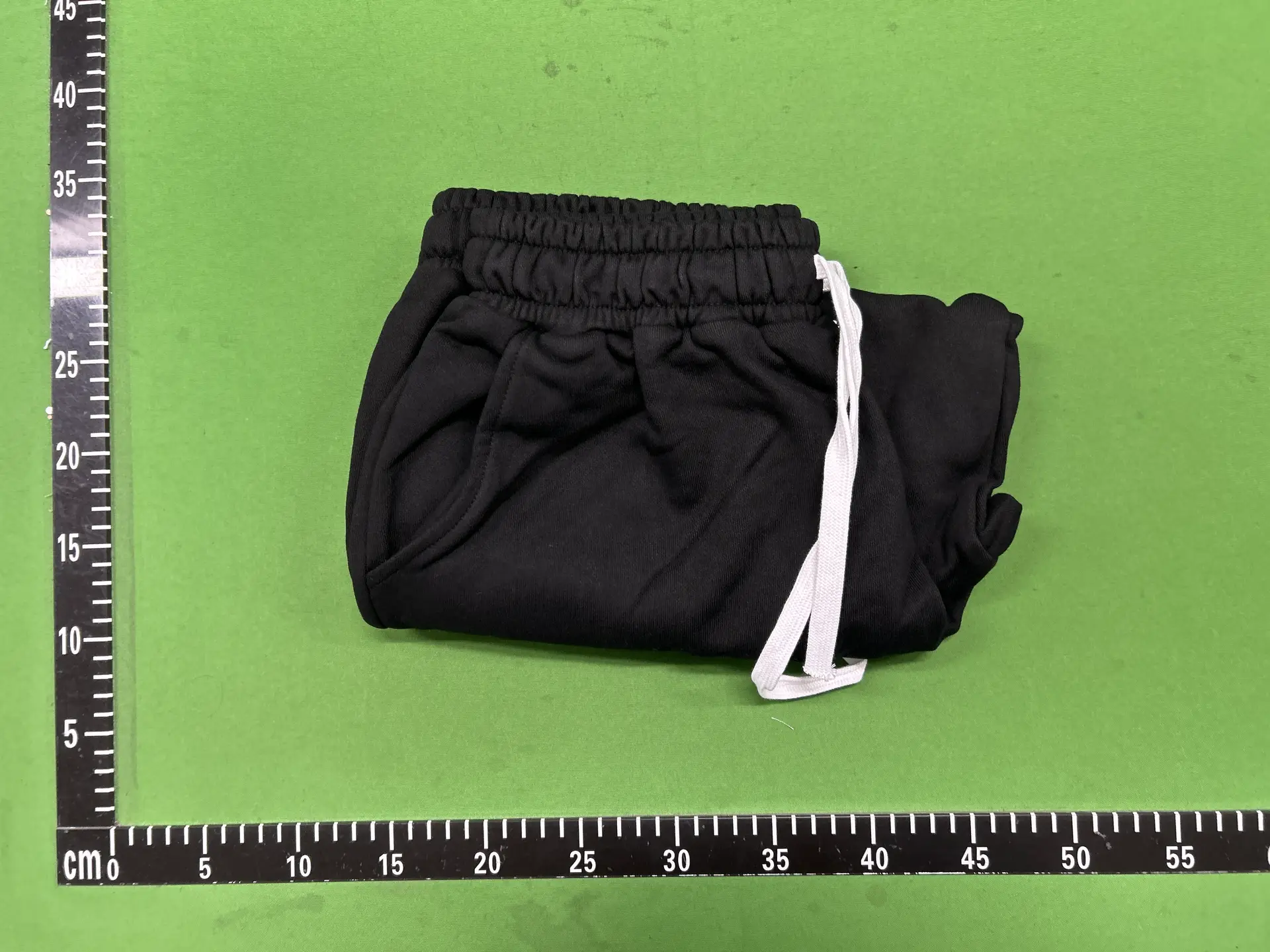 Black shorts with white drawstring