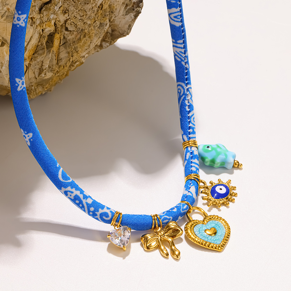 Cross-Border 18K Gold-Plated Stainless Steel Fabric Necklace with Heart-Shaped Evil Eye Pendant, Niche Ethnic Style Jewelry
