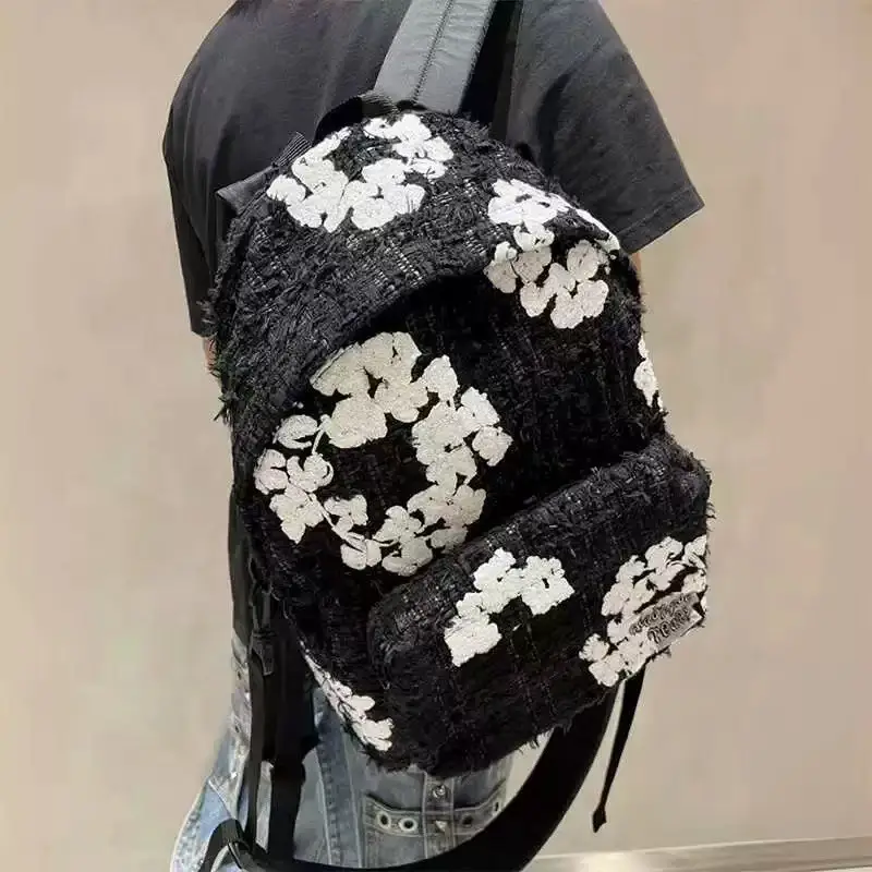 DENIM TEARS co-branded small perfume design sense of ten thousand needle embroidery shoulder bag leisure men and women computer schoolbag