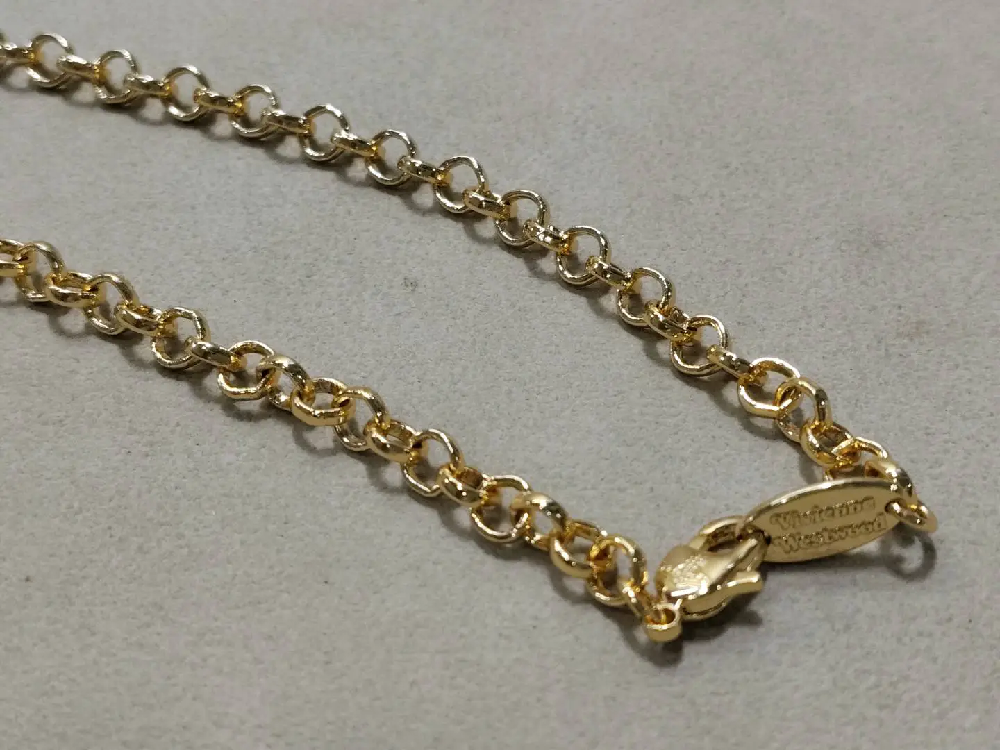 Vivienne Westwood gold Saturn necklace