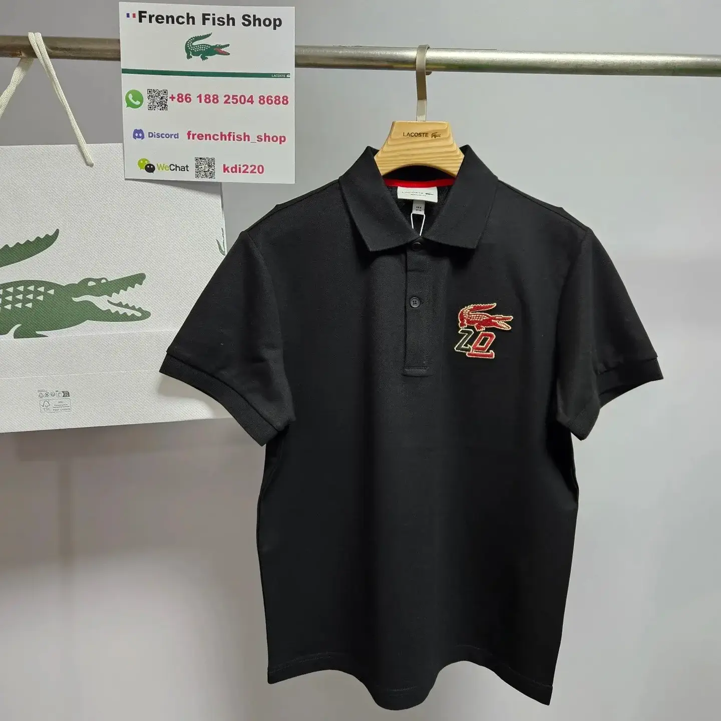 Lacoste Black Polo Shirt with Red and Gold Logo