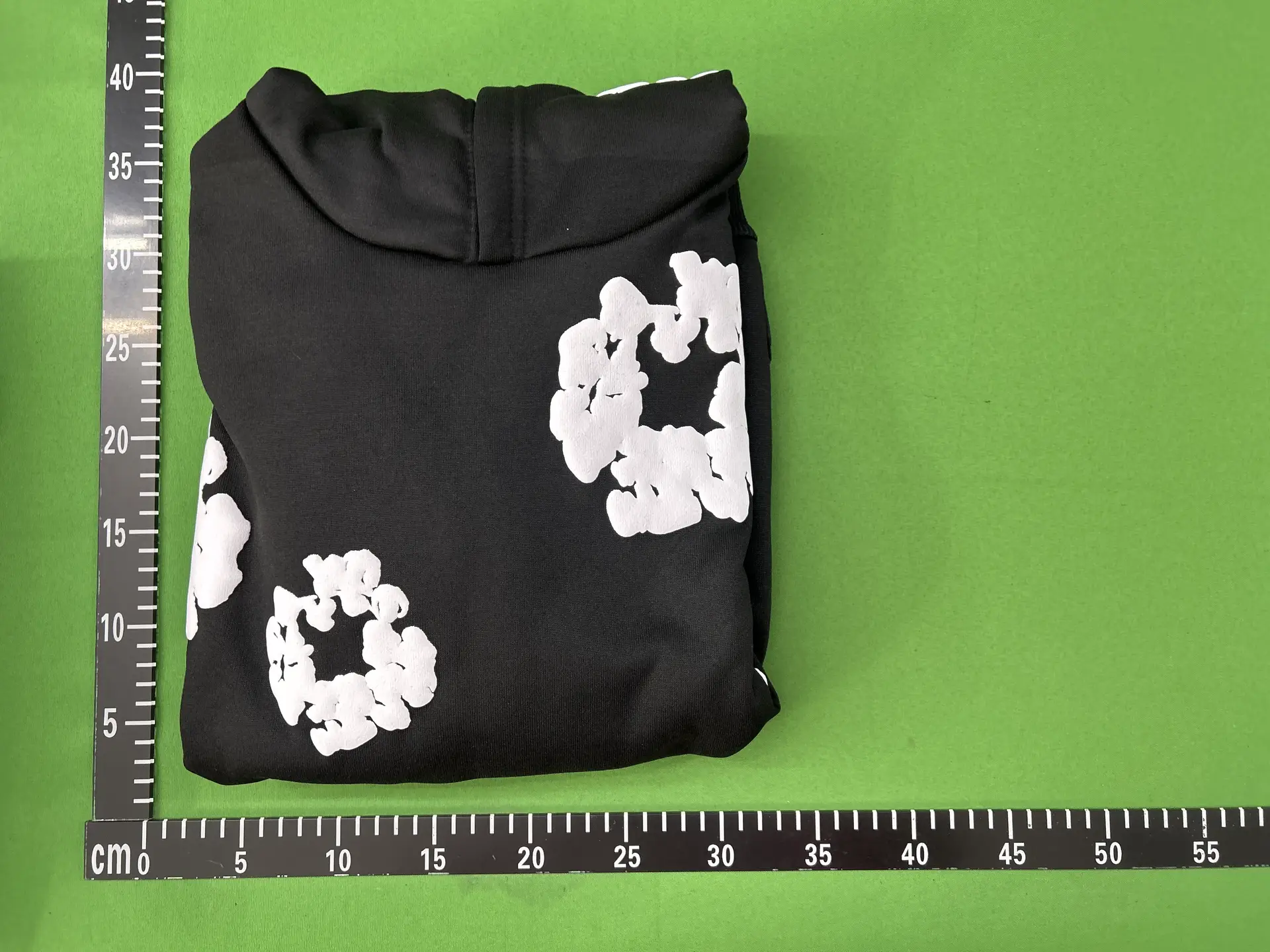 Black hoodie with white floral print