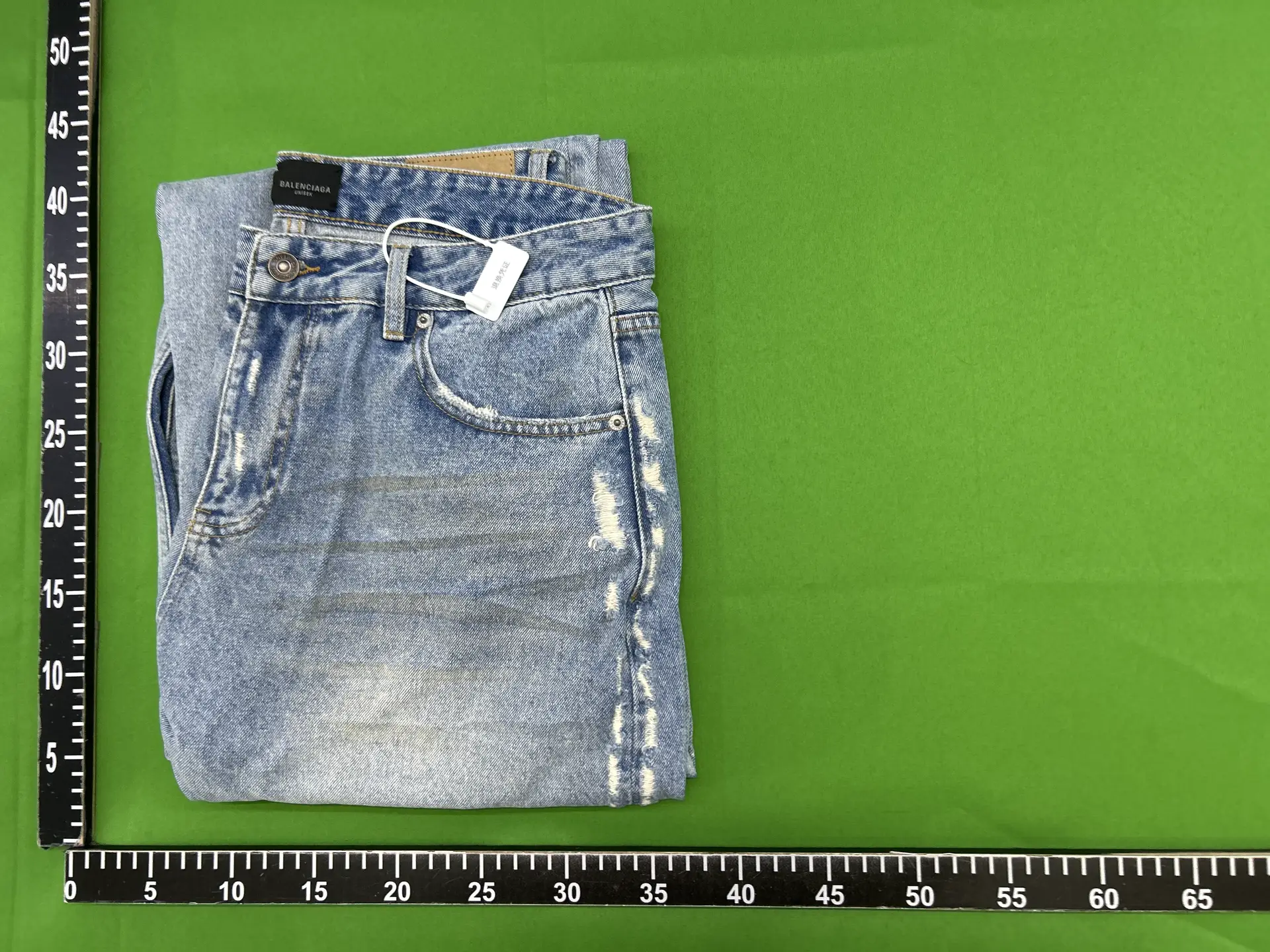 BALENCIAGA Distressed Light Wash Denim Jeans