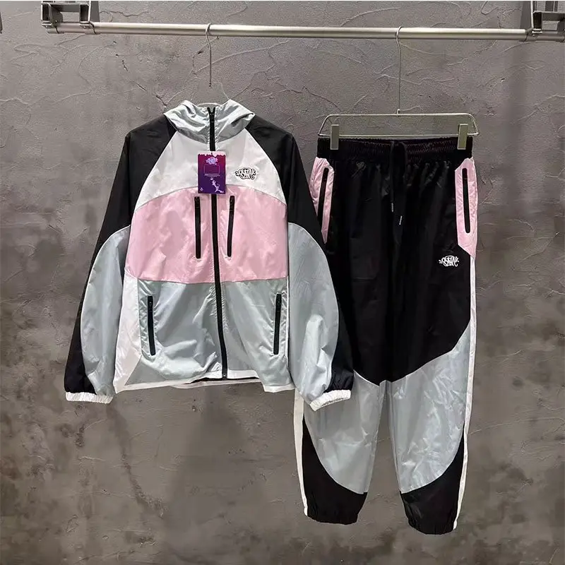 Syna World American Street Embroidery Letter Splicing Color Contrasting Hooded Windbreaker, Sports and Casual Pants Set