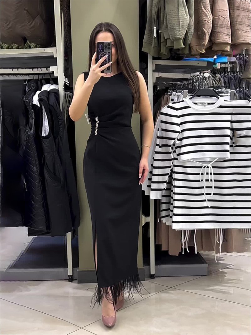 Amazon independent station European and American Foreign trade spring new round neck solid color sleeveless slim bottom tassel dress women