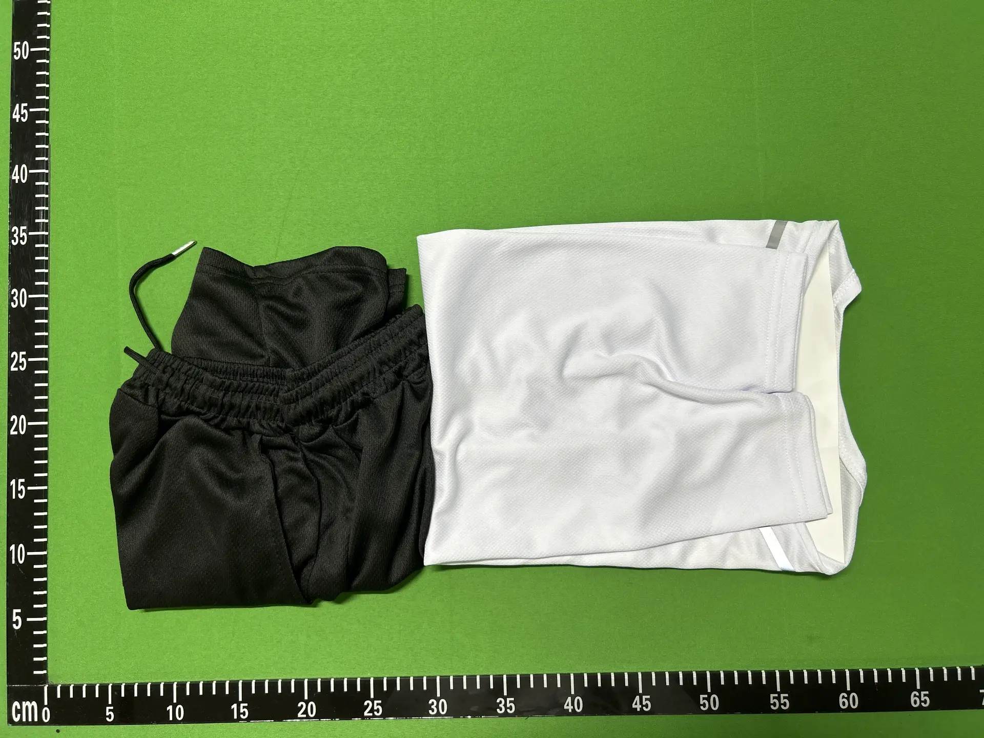 Black shorts and white t-shirt
