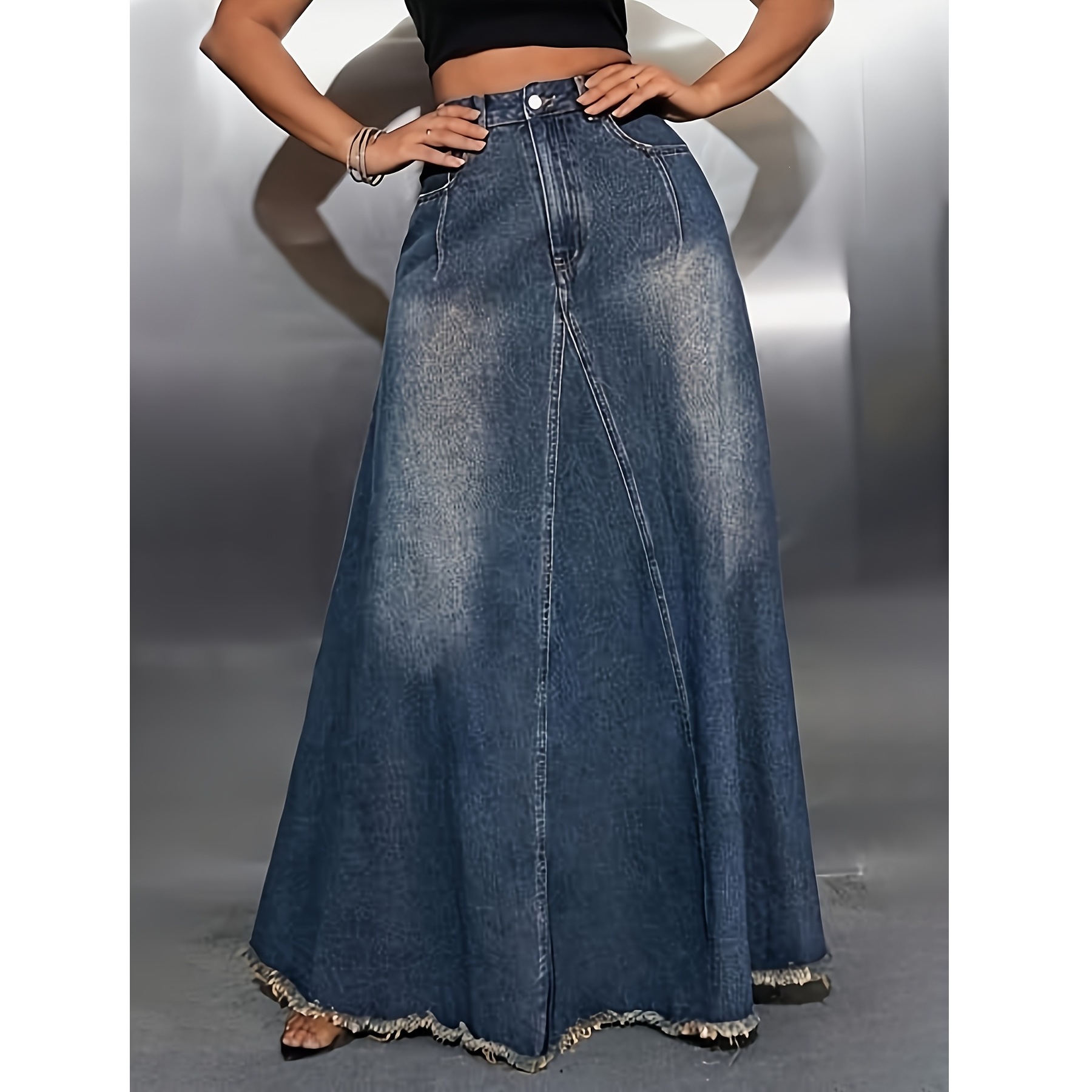 Deep Denim High-Waisted Long Skirt with a Large Hem, Distressed Wash, Textured Frayed Hem, Brings a Relaxed Feel, Vintage Style, and Enhances Elegance