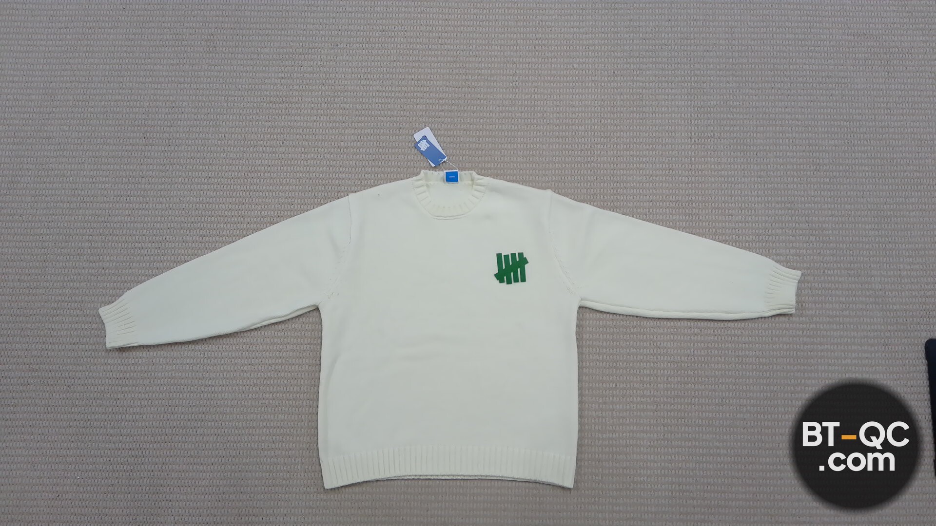 Undefeated Sweater Cream QC