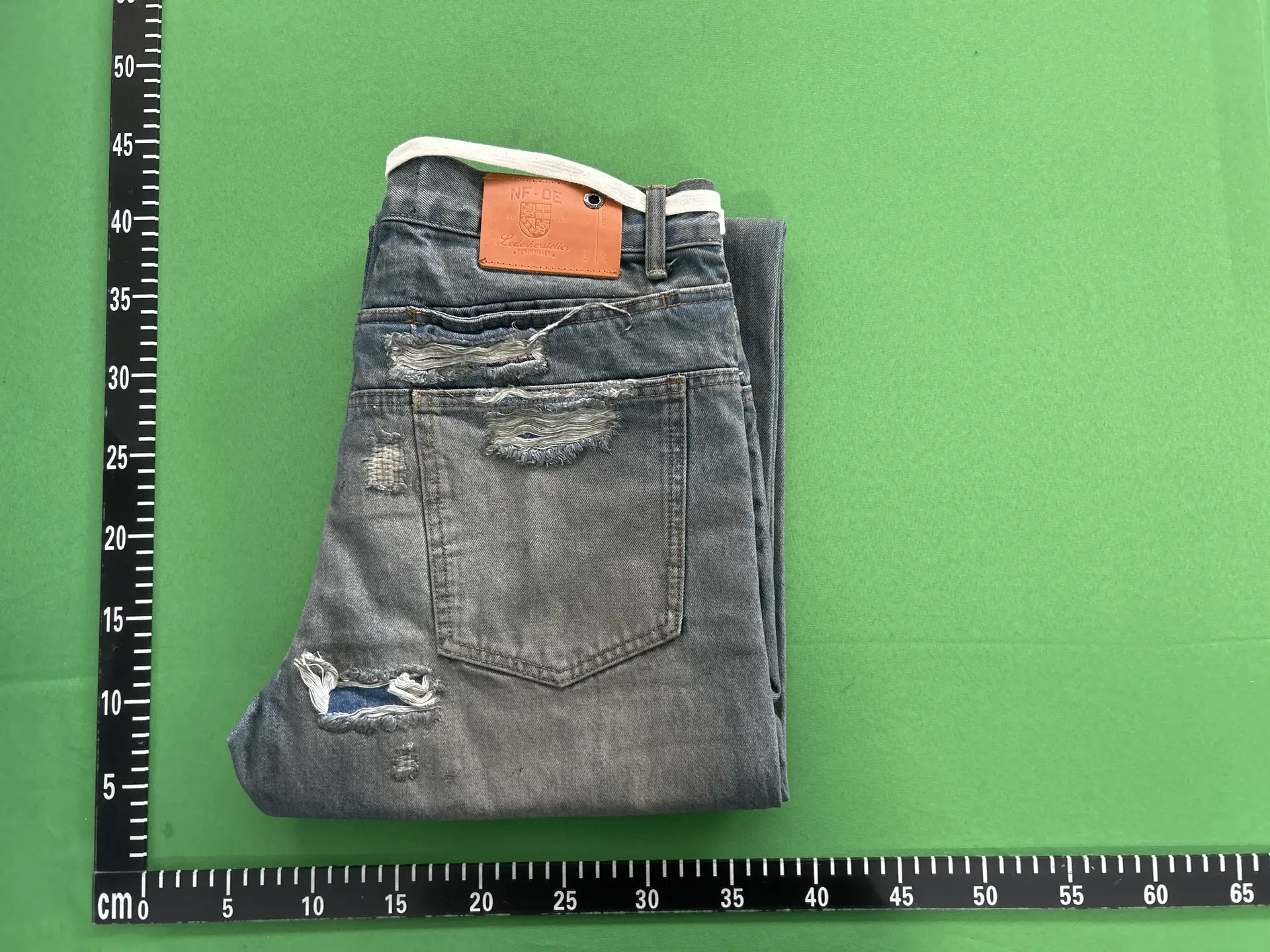 No Faith studios limited edition red ear edging Danny denim washed distressed patchwork splashed ink original cow pants