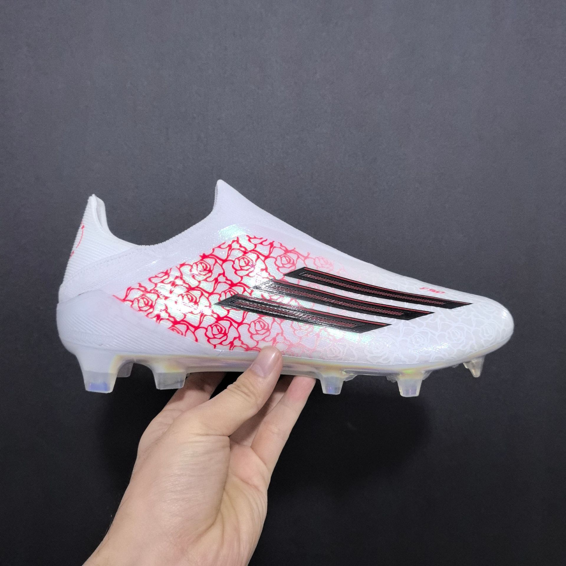 Putian Manufacturer Cross-Border Foreign Trade Wholesale F50 Competition Outdoor Laceless Fg Spike Men's and Women's Soccer Shoes Cross-Border Foreign Trade QC-foto från 1688 på Qualit.ly