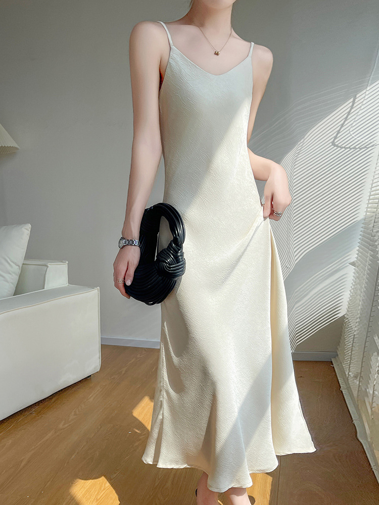 2026 Summer New Style French Satin V-Neck Suspender Dress for Women with Backless Embossed Design, Fashionable and Versatile Long Dress