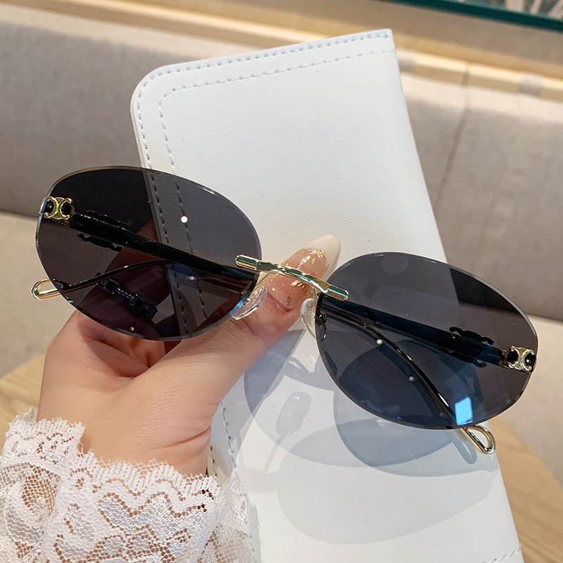 2025 Frameless Sunglasses Women's High-end Arc de Triomphe Retro Fashion Sunscreen Sunglasses Oval Frame Metal Sunglasses Men