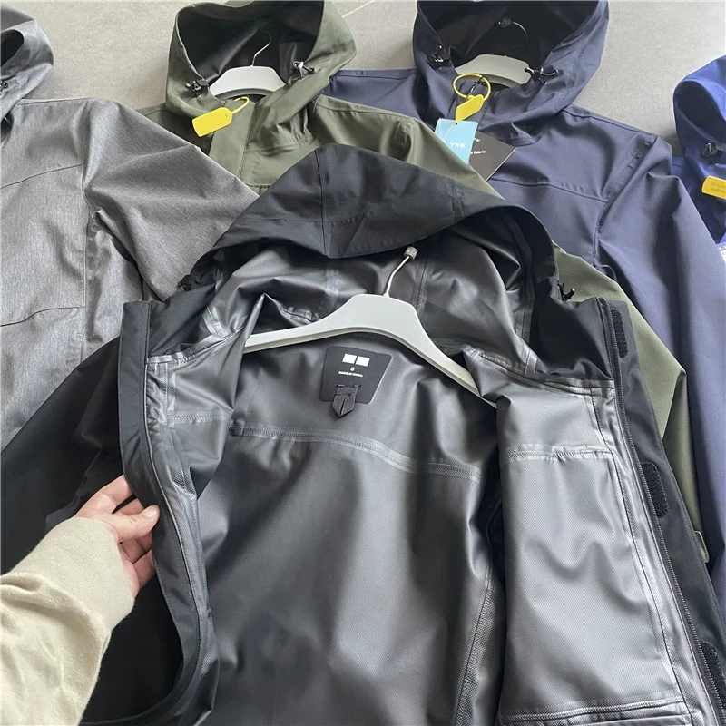 Full-Body Waterproof Protection Against Heavy Rain! Classic Bird-Style Outdoor Casual Hooded Jacket for Men, Waterproof and Breathable Softshell Jacket Foto QC de TAOBAO na Qualit.ly