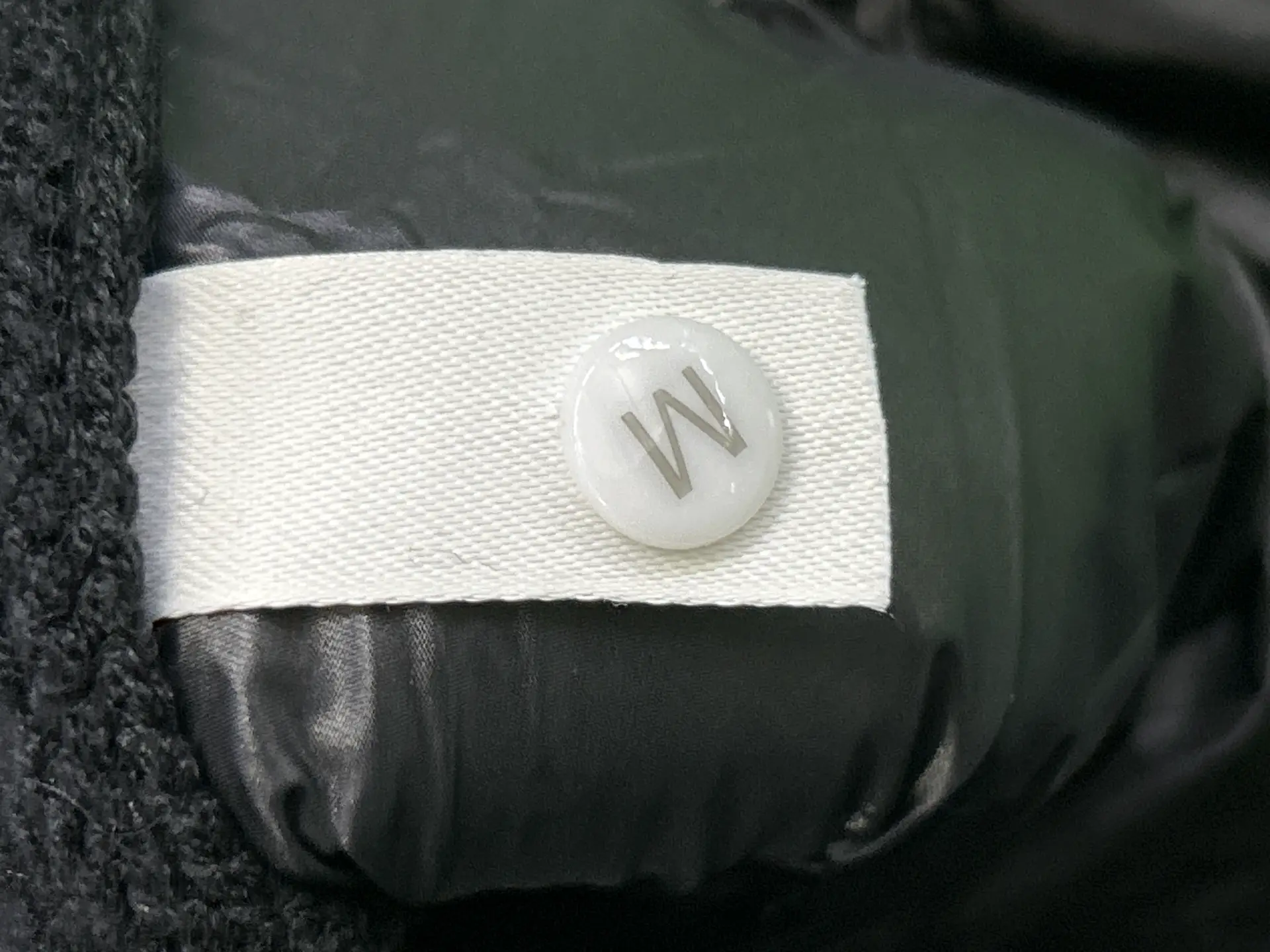 针织左臂黑圆两色羽绒服412120136