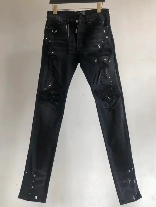 pingu ripped colorful paint jeans black