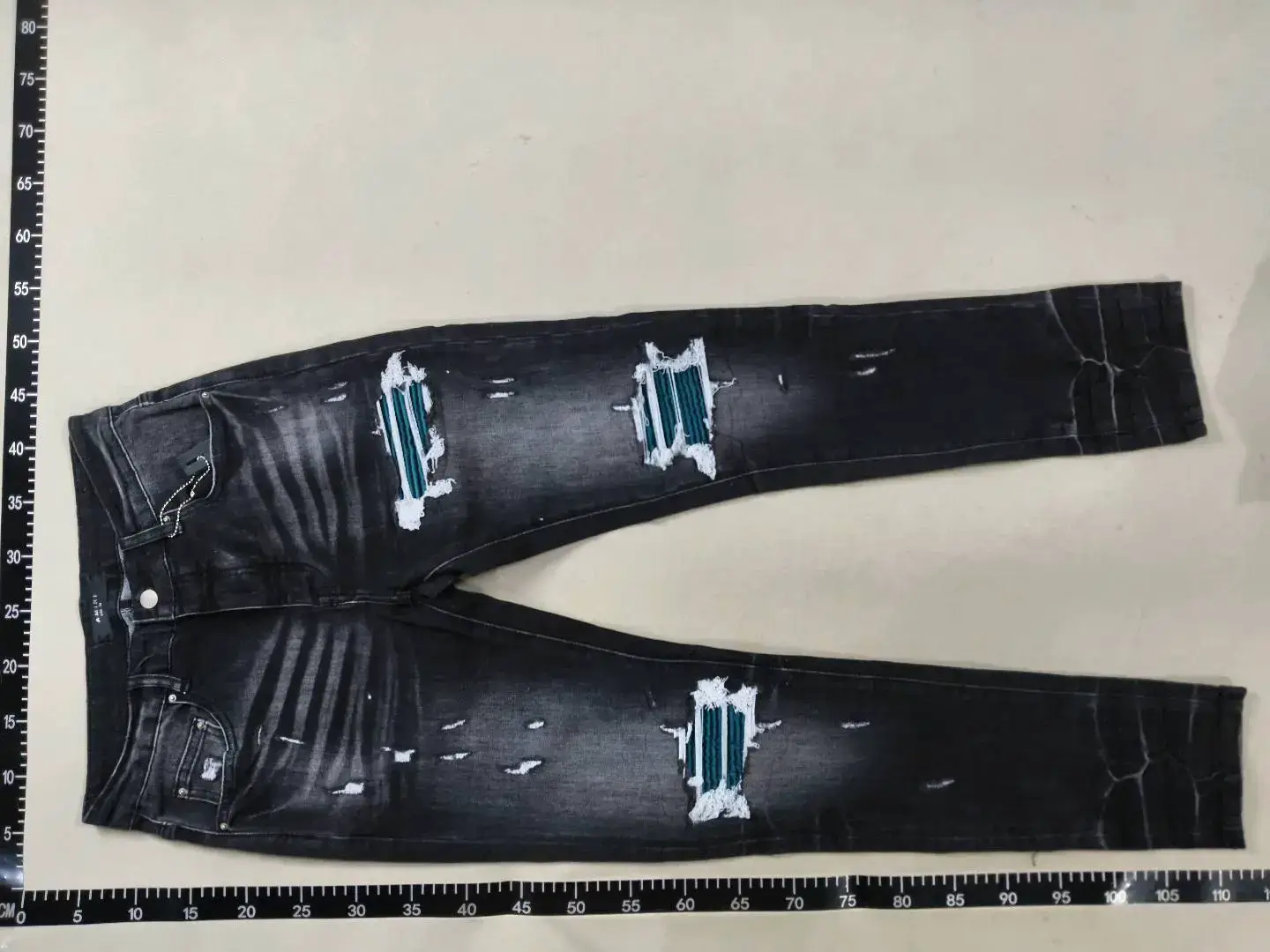 AMIRI Black Washed Distressed Ripped Patch Jeans