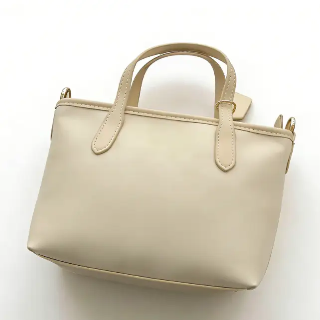 Fully Symmetrical, Buttoned, Four-Color Handbag 22121668