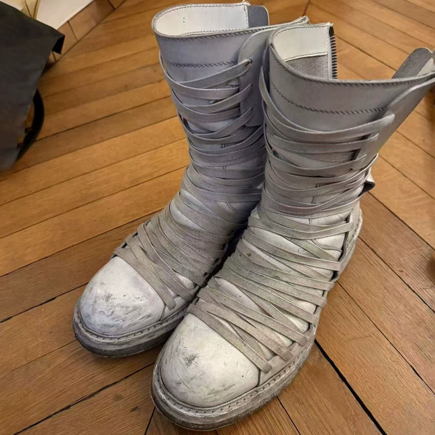 White vintage handmade vintage polished ninja high top boots for men with thick soles and multiple straps, Martin boots with zippers, motorcycle boots