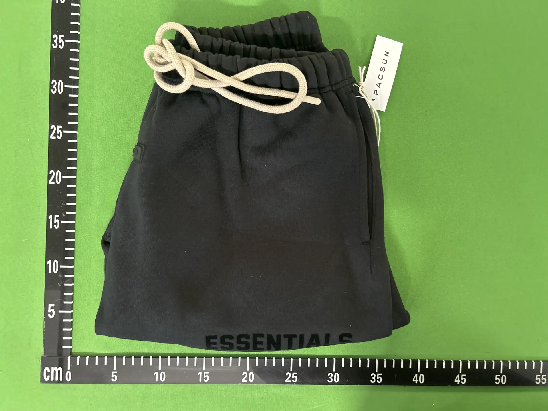 Fear of God Essentials black shorts