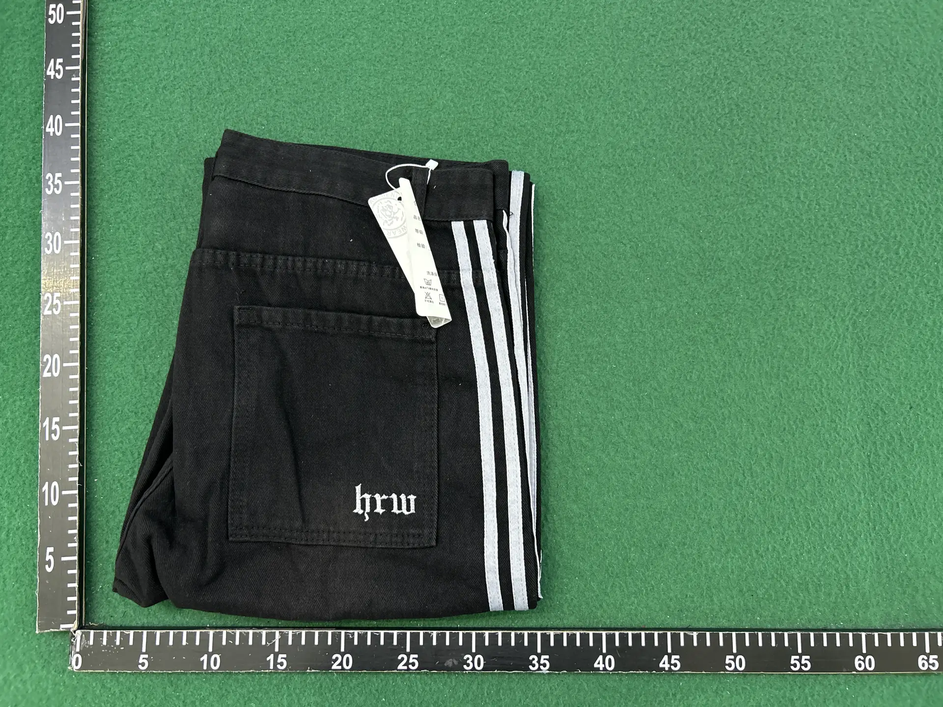 HRW black wide-leg pants with white stripes