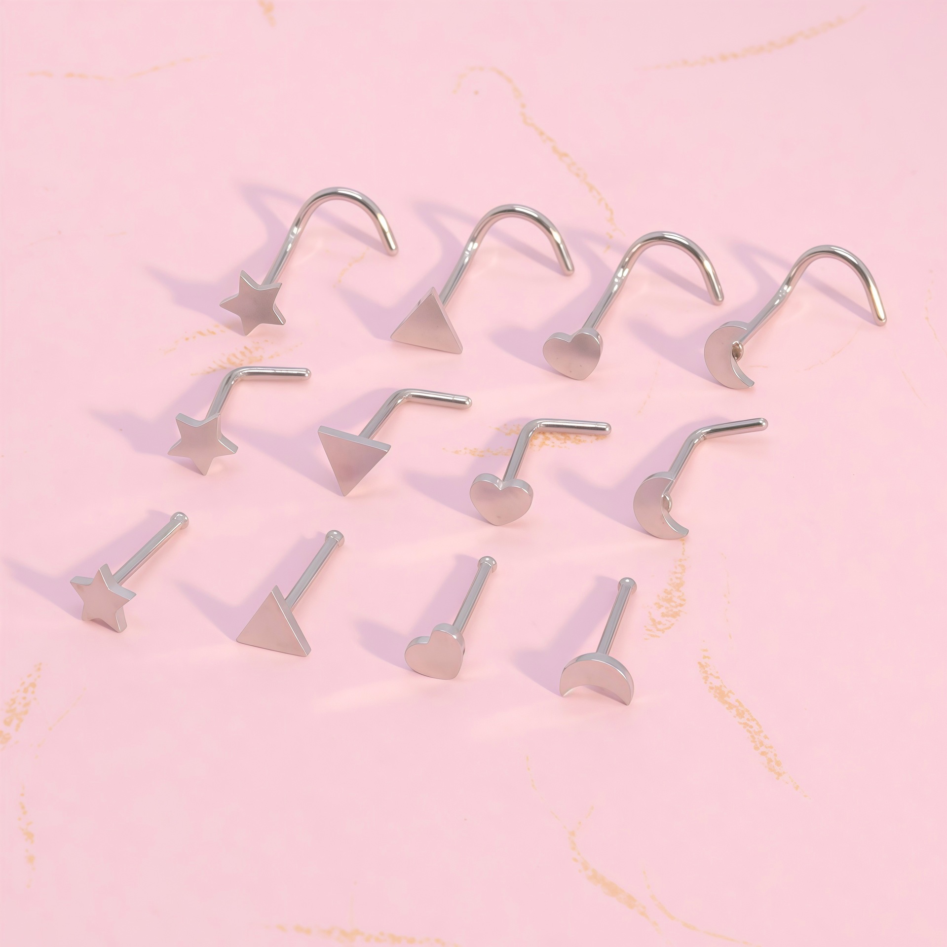 Factory Wholesale Classic 316 Stainless Steel Mini Nose Studs in Various Shapes Such as Heart and Five-Pointed Star for Nose Piercing