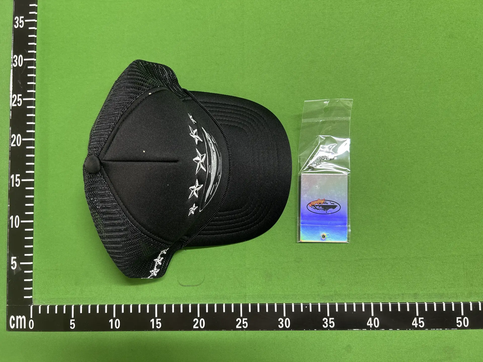 Black trucker hat with moon and stars design