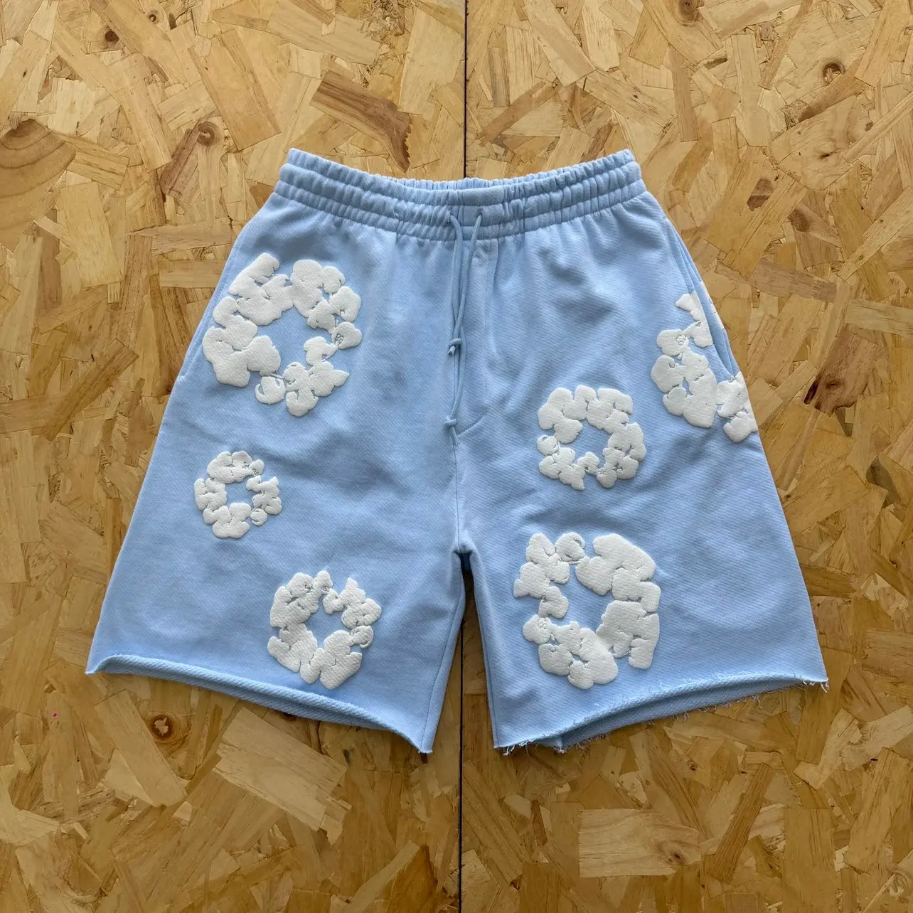 Light Blue Shorts with White Cloud Appliques