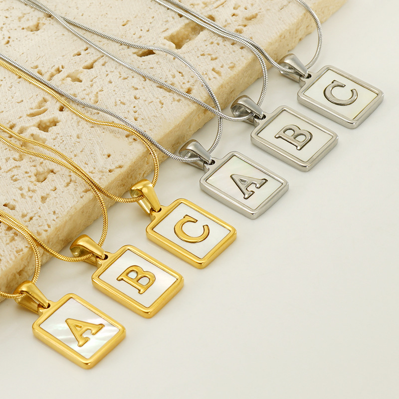 European and American fashion stainless steel square white shell design 26 English letter necklace gold titanium steel snake chain wholesale women