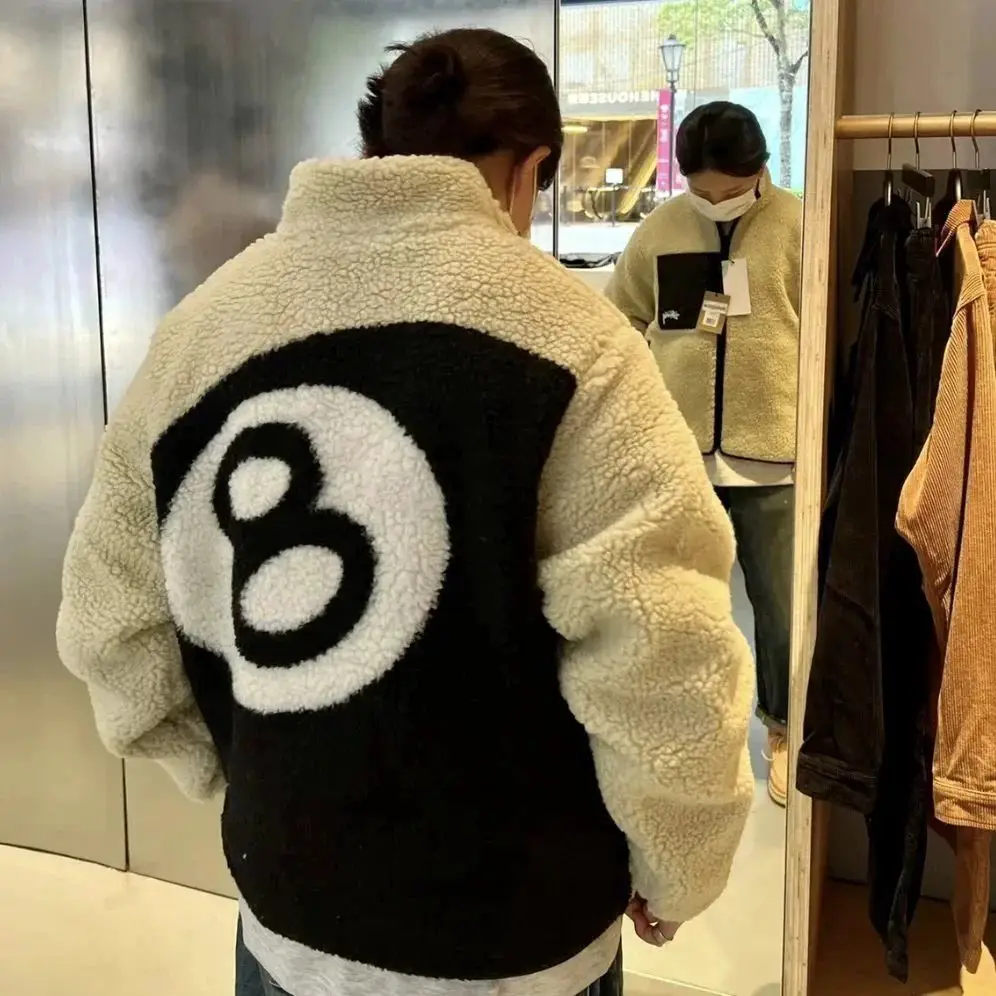 Reversible shaggy furry coat with a billion dots of awesome.