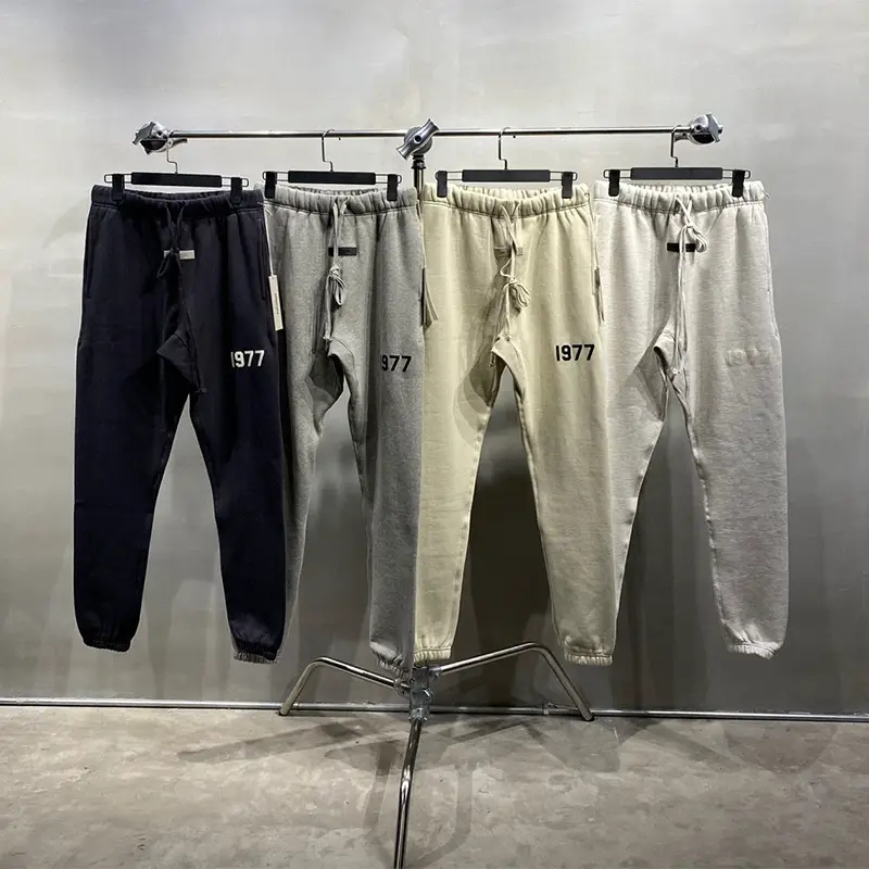 Source Fog Essentials Multi-Line 1977 Flocking Printed Pants High Street Leggings Drawstring Couple Sweatpants for Men