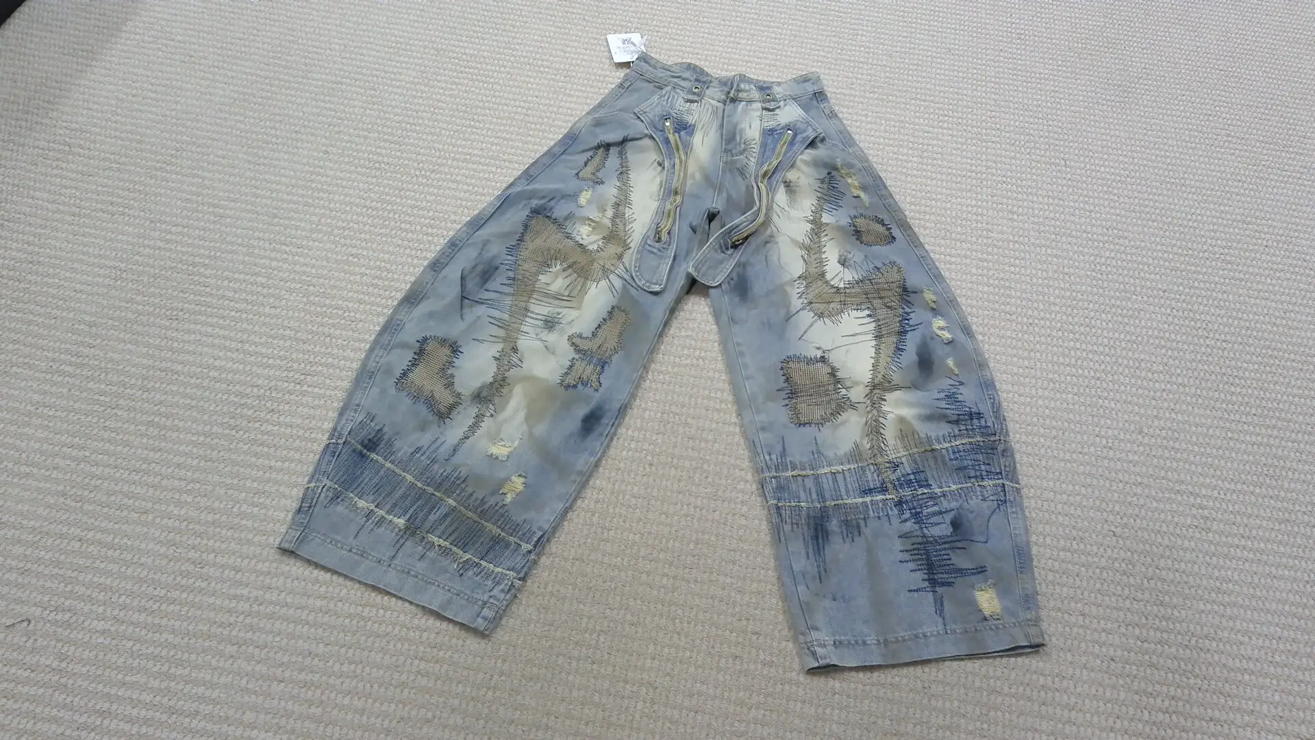 Large size American street heavy industry, random needle embroidery stains, jeans, men's and women's wasteland style, loose wide leg curved knife pants, trendy