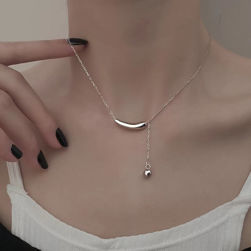 Temperament niche titanium steel non-fading small eggplant ball tassel necklace women's high-grade design clavicle chain sweater chain