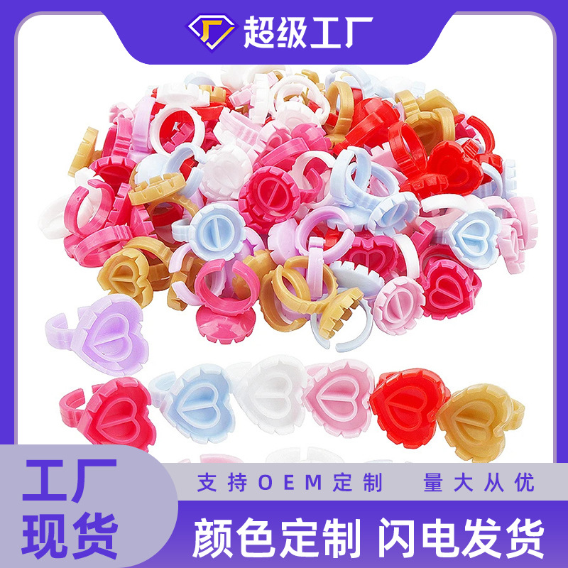 Wholesale eyelash heart-shaped ring cup 100/bag eyelash glue tray grafting eyelash flowering cup tattoo tools