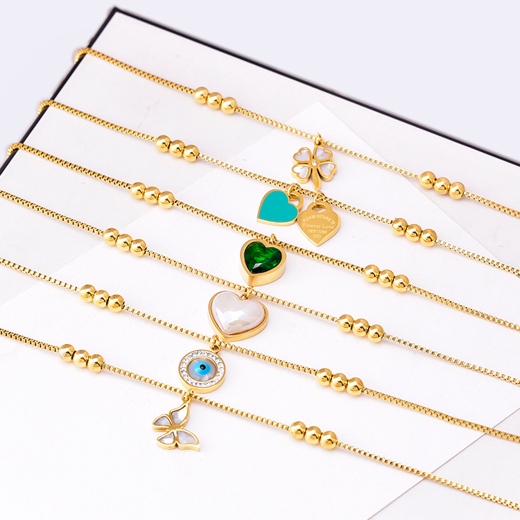 A variety of small golden bean love anklet simple all-match fritillary butterfly green zircon foot ornaments female titanium steel non-fading wholesale