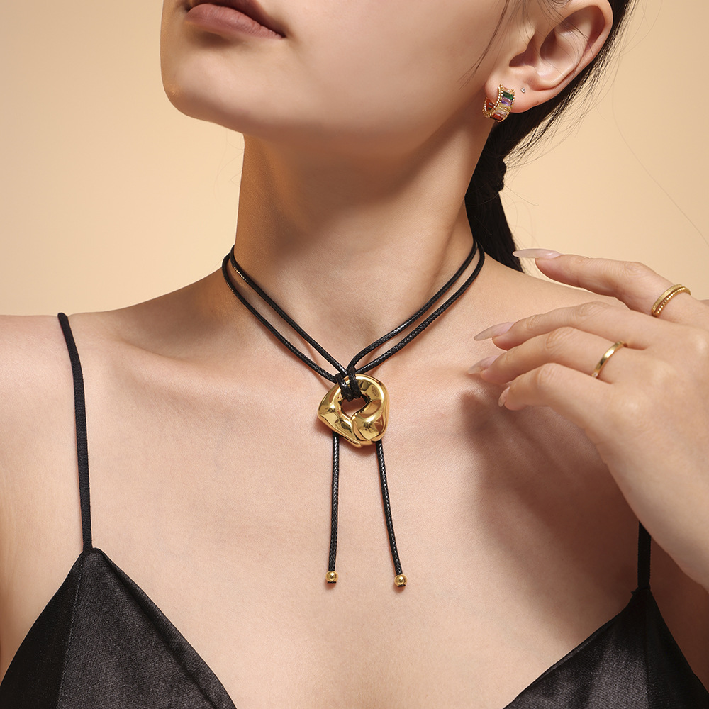 Europe and the United States new leather rope adjustable sweater chain heavy industry curved surface design titanium steel material plated 18k gold PVD color retention
