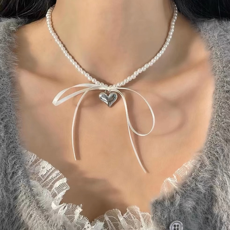 South Korea three-dimensional metal love ribbon bow pearl necklace niche design fashion clavicle chain wholesale