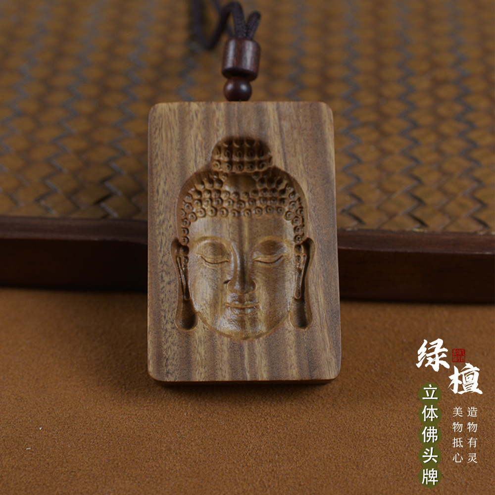 Green sandalwood 3D listing concave carving three-dimensional Buddha head pendant nothing card text play pendant sandalwood hand piece wholesale factory