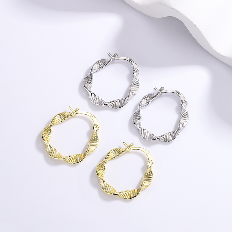 New Korean version of simple spiral twisted ear buckle women's exquisite temperament cold wind high sense exaggerated ear jewelry wholesale