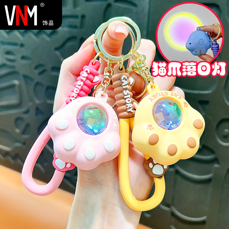 Cartoon luminous cat claw atmosphere lamp key chain cute small commodity doll key chain net red creative jewelry supply