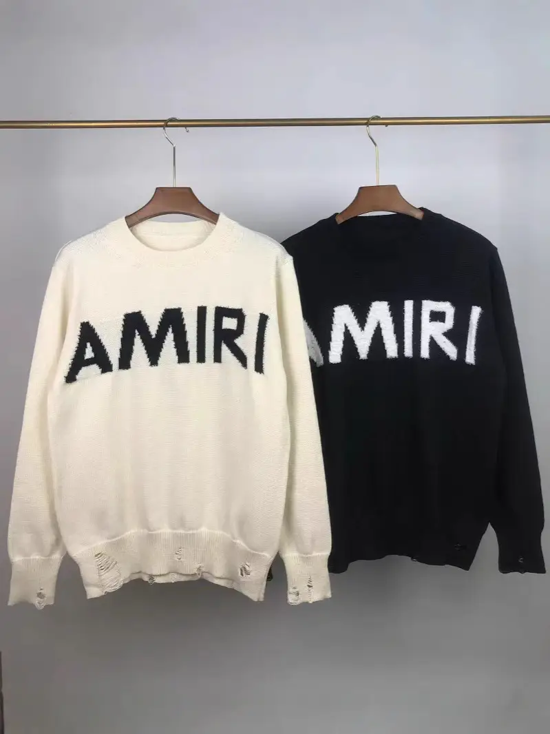 24Ss Cross-Border Trendy Brand Amiri Autumn and Winter Round Neck Sweater for Men and Women, Versatile Letter Jacquard Tassel Ripped Style