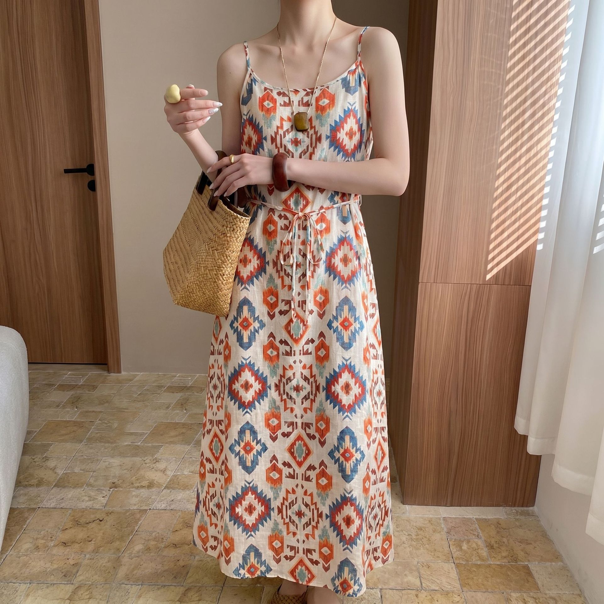 Bohemian Style Suspender Dress for Women 2026 Summer New Dopamine Seaside Resort Style Loose Floral Dress
