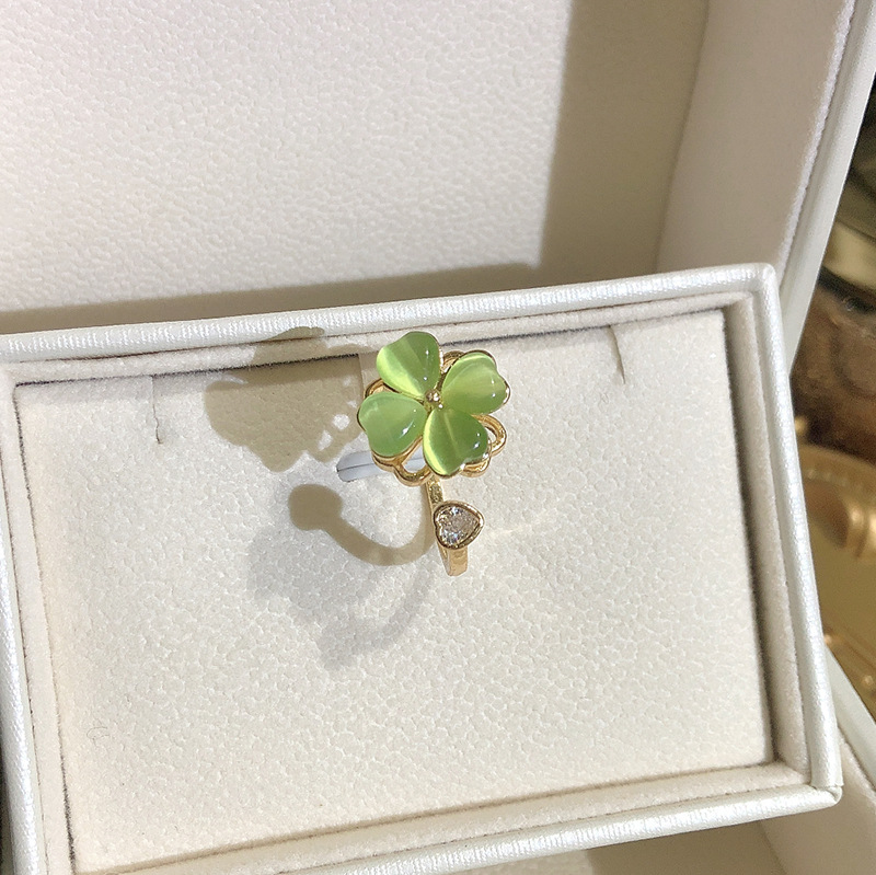 Small fresh personality open ring independent packaging European and American rotating green four leaf flower golden open free size ring