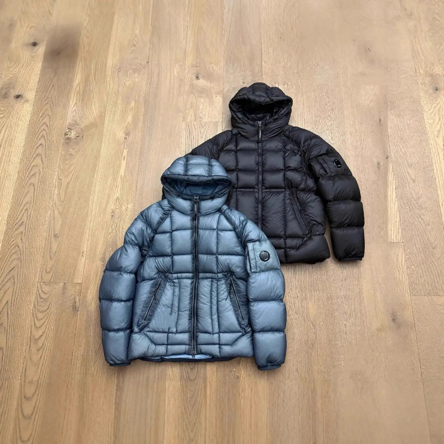 CP Company puffer jackets black and blue