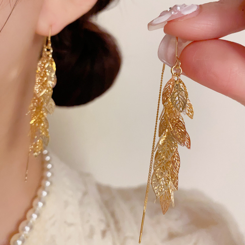 European and American Cross-Border Style Fashion Metal Hollow Leaf Tassel Earrings Light Luxury Simple Long Slimming Earrings Wholesale