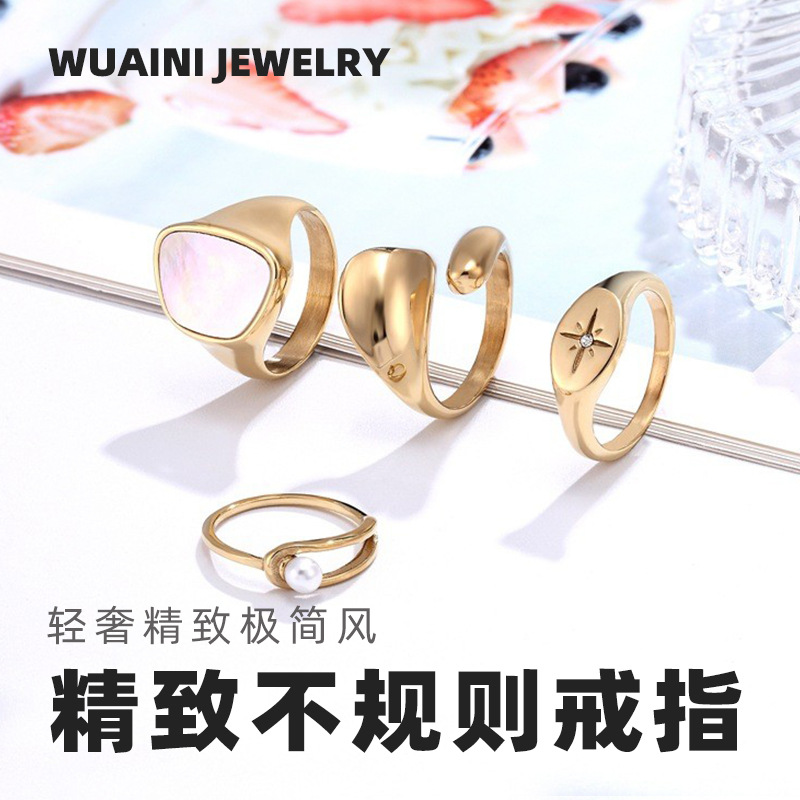 European and American ins design pearl cross titanium steel ring personality female seven awn star ring hollow ring wholesale does not fade